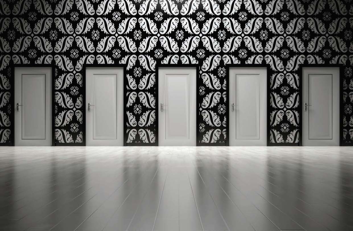 An image of 5 doors surrounded by patterned wallpaper